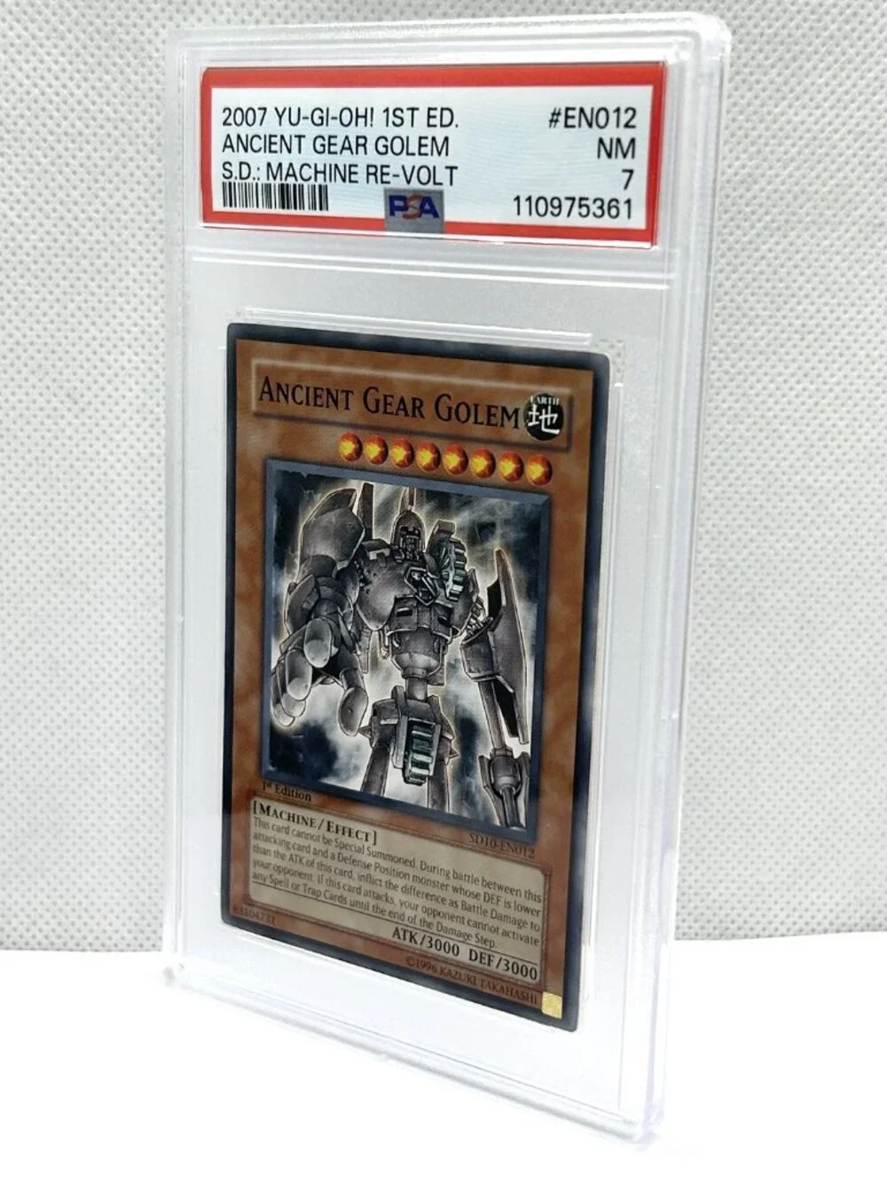 Ancient Gear Golem YU_GI-Oh! 1st Ed. 2007 S.D.; Machine Re-Volt PSA Graded 7 NM
